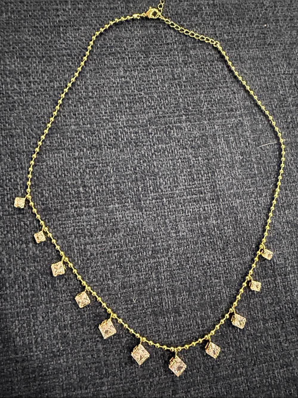 Women’s gold dangle necklace